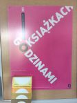 Zdjęcie przedstawia książkę i plakat