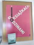 Zdjęcie przedstawia książkę i plakat