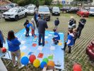 Na zdjęciu uczestnicy wielkoformatowej gry planszowej