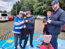 Na zdjęciu uczestnicy wielkoformatowej gry planszowej